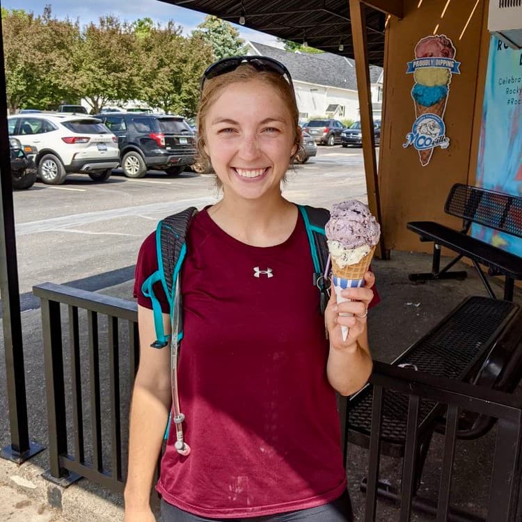 Picture of me in bike gear with an ice cream cone in hand